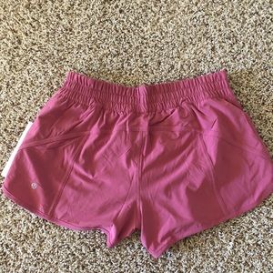 lululemon athletica Shorts - NWT Lululemon tracker short 4” in lush. Size 12 lululemon athletica Shorts - NWT Lululemon tracker short 4” in lush. Size 12